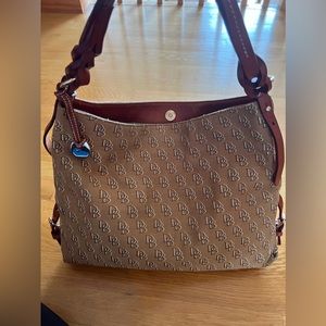 Dooney & Bourke hobo in brown/white, cognac leather strap w/ gold buckle